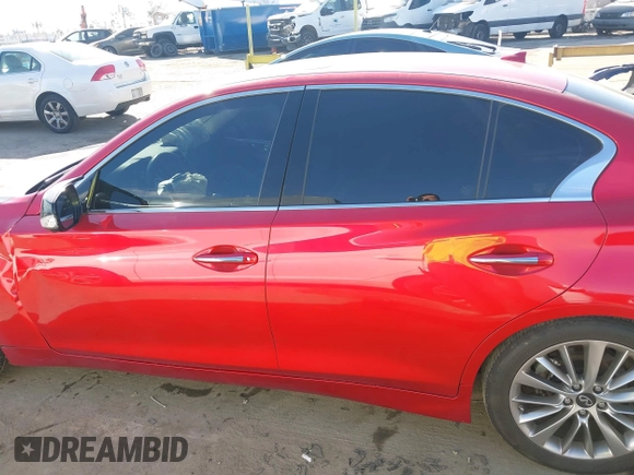 2022 Infiniti Q50 Luxe z VIN JN1EV7BP9NM312072, wystawiony jako IAAI lot #41621411 z przebiegiem 33 323 mil mil oraz . Historia ofert i sprzedaży dostępna na DreamBid. Obrazek 14.