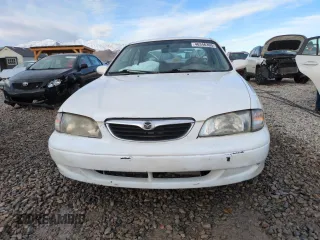 1999 Mazda 626 ES with VIN 1YVGF22C9X5887587, listed as a Copart auction lot 46346305 with 92,715 mi miles and Salvage Title. Bid and sale history available at carsss.com. Image 5.
