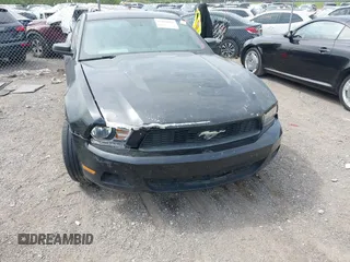 2012 Ford Mustang V6 Premium with VIN 1ZVBP8AM3C5274138, listed as a IAAI auction lot 42060091 with 228,384 mi miles. Bid and sale history available at carsss.com. Image 6.