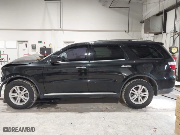 2013 Dodge Durango Crew with VIN 1C4SDJDT9DC670738, listed as a IAAI auction lot 41329419 with 149,520 mi miles. Bid and sale history available at carsss.com. Image 15.