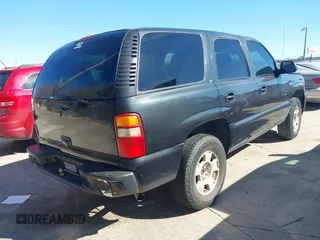 2003 GMC Yukon SLT with VIN 1GKEC13V23R135379, listed as a IAAI auction lot 41637458 with 236,134 mi miles. Bid and sale history available at carsss.com. Image 4.