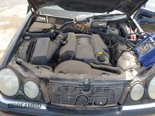 1998 Mercedes-Benz E-Class with VIN WDBJF65F1WA631361, listed as a IAAI auction lot 41870881 with 101,292 mi miles. Bid and sale history available at carsss.com. Image 10.