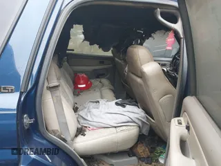 2002 Chevrolet Tahoe LT z VIN 1GNEC13Z82R238343, wystawiony jako IAAI lot #41796657 z przebiegiem Nie podano mil oraz . Historia ofert i sprzedaży dostępna na DreamBid. Obrazek 8.