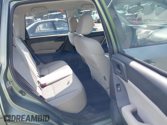 2015 Subaru Forester 2.5i with VIN JF2SJABC2FH508209, listed as a IAAI auction lot 42795593 with 210,479 mi miles and . Bid and sale history available at DreamBid. Image 8.