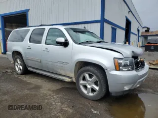 2013 Chevrolet Suburban LT with VIN 1GNSCJE07DR305437, listed as a Copart auction lot 55346605 with 160,518 mi miles and Salvage title. Bid and sale history available at DreamBid. Image 4.
