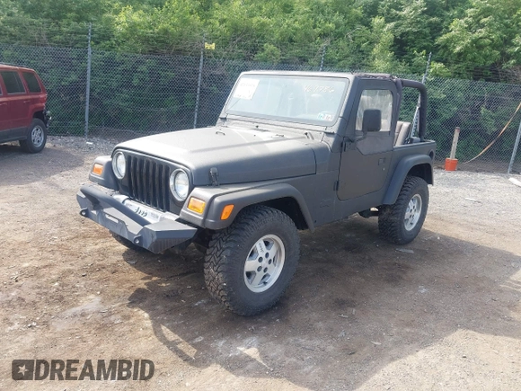 1999 Jeep Wrangler SE with VIN 1J4FY29P3XP469786, listed as a IAAI auction lot 42131018 with 130,918 mi miles and . Bid and sale history available at DreamBid. Image 2.