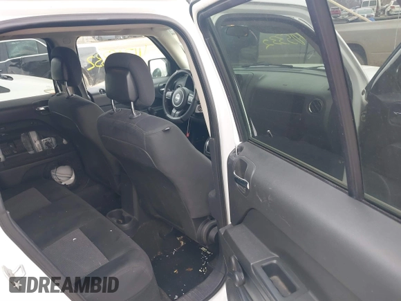 2014 Jeep Patriot Sport with VIN 1C4NJRBB0ED502111, listed as a IAAI auction lot 41705332 with 200,384 mi miles and . Bid and sale history available at DreamBid. Image 8.