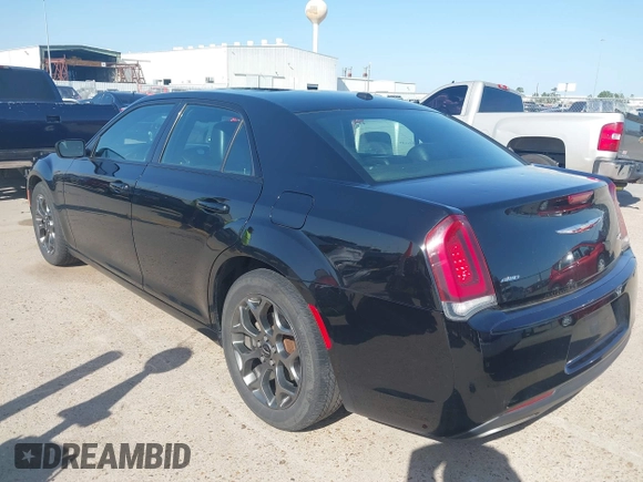 2015 Chrysler 300 with VIN 2C3CCAGG1FH815698, listed as a IAAI auction lot 41853449 with 172,507 mi miles. Bid and sale history available at carsss.com. Image 3.