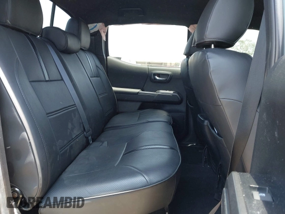 2022 Toyota Tacoma SR with VIN 3TYCZ5AN0NT104300, listed as a IAAI auction lot 42652503 with 18,071 mi miles and . Bid and sale history available at DreamBid. Image 8.