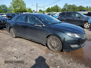 2014 Lincoln MKZ z VIN 3LN6L2J90ER802254, wystawiony jako Copart lot #58727025 z przebiegiem 172 297 mil mil oraz Szkoda całkowita • Salvage title. Historia ofert i sprzedaży dostępna na DreamBid. Obrazek 4.