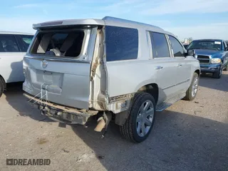 2015 Cadillac Escalade Luxury with VIN 1GYS4BKJ1FR300806, listed as a IAAI auction lot 41816789 with 131,457 mi miles. Bid and sale history available at carsss.com. Image 4.