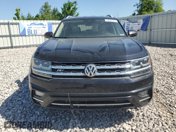 2018 Volkswagen Atlas SE z VIN 1V2PR2CAXJC534254, wystawiony jako Copart lot #61452935 z przebiegiem 105 956 mil mil oraz Czysty tytuł • Clean title. Historia ofert i sprzedaży dostępna na DreamBid. Obrazek 5.