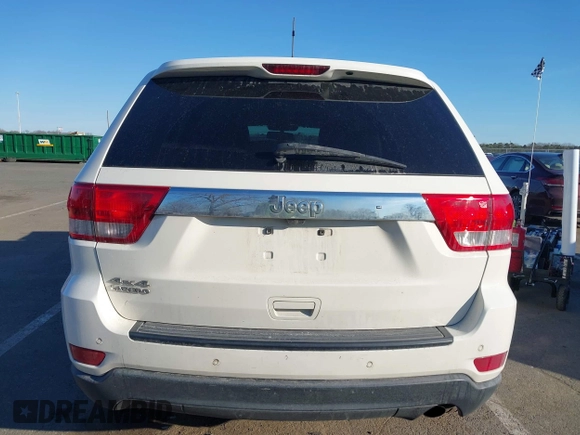2012 Jeep Grand Cherokee Laredo with VIN 1C4RJFAG5CC310893, listed as a IAAI auction lot 41695279 with 136,821 mi miles. Bid and sale history available at carsss.com. Image 16.