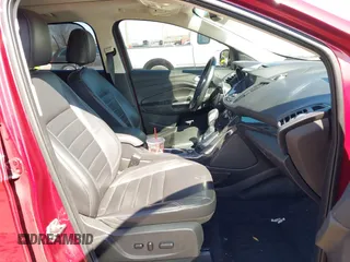 2016 Ford Escape Titanium with VIN 1FMCU9J98GUB42453, listed as a IAAI auction lot 41760110 with 116,452 mi miles. Bid and sale history available at carsss.com. Image 5.