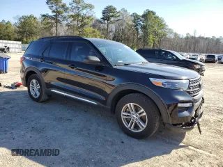 2023 Ford Explorer XLT with VIN 1FMSK8DHXPGA83337, listed as a Copart auction lot 45030485 with 11,833 mi miles and Salvage Title. Bid and sale history available at DreamBid. Image 4.