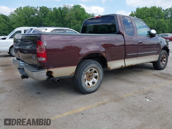 2000 Ford F-150 z VIN 1FTPX17LXYNA52377, wystawiony jako IAAI lot #42265332 z przebiegiem 220 971 mil mil oraz . Historia ofert i sprzedaży dostępna na DreamBid. Obrazek 4.