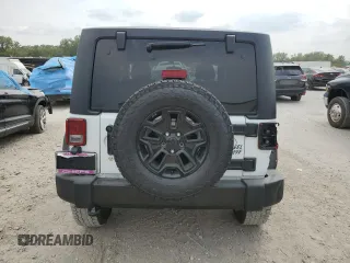 2016 Jeep Wrangler Willys Wheeler z VIN 1C4AJWAG7GL297695, wystawiony jako Copart lot #70838414 z przebiegiem 82 813 mil mil oraz Szkoda całkowita • Salvage title. Historia ofert i sprzedaży dostępna na DreamBid. Obrazek 6.
