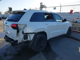 2017 Jeep Grand Cherokee SRT with VIN 1C4RJFDJ7HC600227, listed as a IAAI auction lot 41390600 with 96,841 mi miles. Bid and sale history available at carsss.com. Image 4.