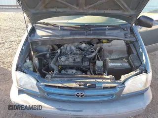 2000 Toyota Sienna CE with VIN 4T3GF19C2YU240254, listed as a IAAI auction lot 40688669 with 1 mi miles. Bid and sale history available at carsss.com. Image 10.