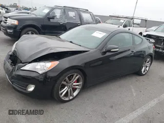 2012 Hyundai Genesis Coupe Grand Touring with VIN KMHHU6KH9CU071252, listed as a IAAI auction lot 42358871 with 92,528 mi miles and . Bid and sale history available at DreamBid. Image 2.
