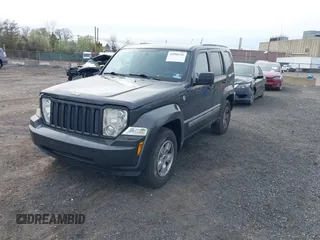 2011 Jeep Liberty Sport with VIN 1J4PN2GK2BW581496, listed as a IAAI auction lot 42080245 with 171,626 mi miles and . Bid and sale history available at carsss.com. Image 2.
