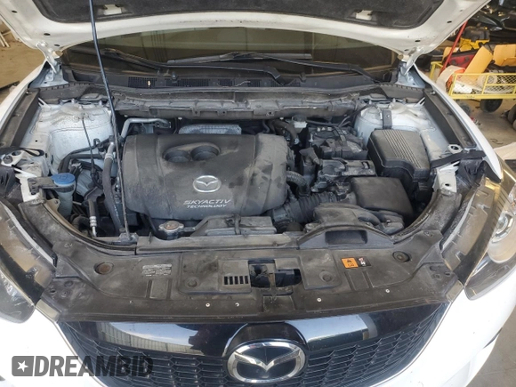 2015 Mazda CX-5 Grand Touring with VIN JM3KE4DY5F0538016, listed as a Copart auction lot 52396685 with 137,272 mi miles and Clean Title. Bid and sale history available at carsss.com. Image 12.