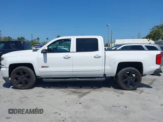2017 Chevrolet Silverado 1500 LT with VIN 3GCUKREC4HG391101, listed as a IAAI auction lot 42129151 with 84,670 mi miles and . Bid and sale history available at DreamBid. Image 14.