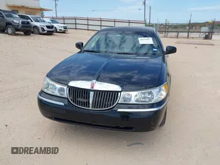 2000 Lincoln Town Car Executive with VIN 1L1FM81W7YY853277, listed as a IAAI auction lot 42533017 with 182,410 mi miles and . Bid and sale history available at DreamBid. Image 6.
