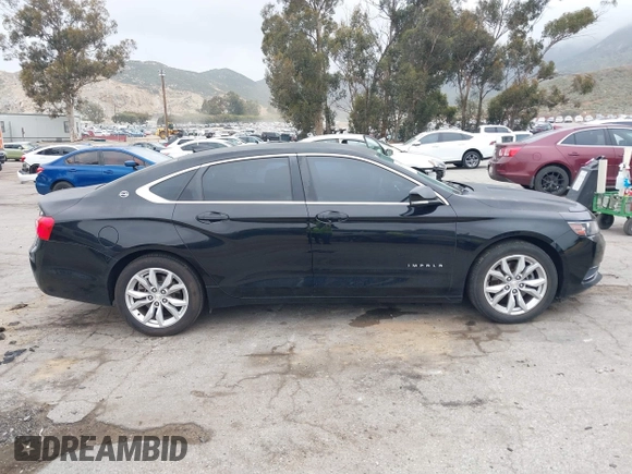 2017 Chevrolet Impala LT with VIN 1G1105SAXHU178101, listed as a IAAI auction lot 41879917 with 151,159 mi miles and . Bid and sale history available at DreamBid. Image 13.
