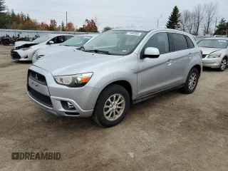2012 Mitsubishi Outlander Sport SE z VIN JA4AJ3AU7CZ600531, wystawiony jako Copart lot #77403264 z przebiegiem 131 976 mil mil oraz Czysty tytuł • Clean title. Historia ofert i sprzedaży dostępna na DreamBid. Obrazek 1.
