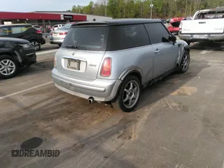 2002 MINI Hardtop with VIN WMWRC33432TE10226, listed as a IAAI auction lot 41973956 with 156,445 mi miles and . Bid and sale history available at DreamBid. Image 4.