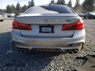 2018 BMW M5 z VIN WBSJF0C56JB282086, wystawiony jako Copart lot #37483454 z przebiegiem Nie podano mil oraz Szkoda całkowita • Salvage title. Historia ofert i sprzedaży dostępna na DreamBid. Obrazek 6.