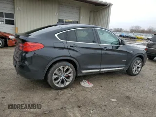 2015 BMW X4 xDrive35i with VIN 5UXXW5C56F0E88267, listed as a Copart auction lot 47888925 with 101,859 mi miles and Salvage title. Bid and sale history available at DreamBid. Image 3.