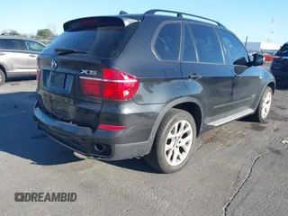 2012 BMW X5 35i z VIN 5UXZV4C50CL744724, wystawiony jako IAAI lot #41635239 z przebiegiem 166 363 mil mil oraz . Historia ofert i sprzedaży dostępna na DreamBid. Obrazek 4.