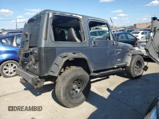 2002 Jeep Wrangler Sport with VIN 1J4FA49S72P715946, listed as a Copart auction lot 70884114 with 114,964 mi miles and Clean Title. Bid and sale history available at carsss.com. Image 3.