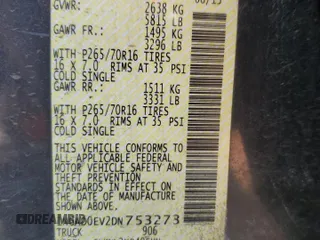 2013 Nissan Frontier SV with VIN 1N6AD0EV2DN753273, listed as a Copart auction lot 57809975 with 201,249 mi miles and Salvage title. Bid and sale history available at DreamBid. Image 13.