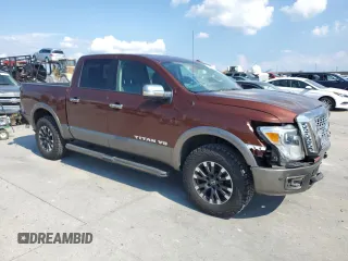 2018 Nissan Titan Pro-4X z VIN 1N6AA1E50JN526481, wystawiony jako Copart lot #71800504 z przebiegiem 147 463 mil mil oraz Szkoda całkowita • Salvage title. Historia ofert i sprzedaży dostępna na DreamBid. Obrazek 4.