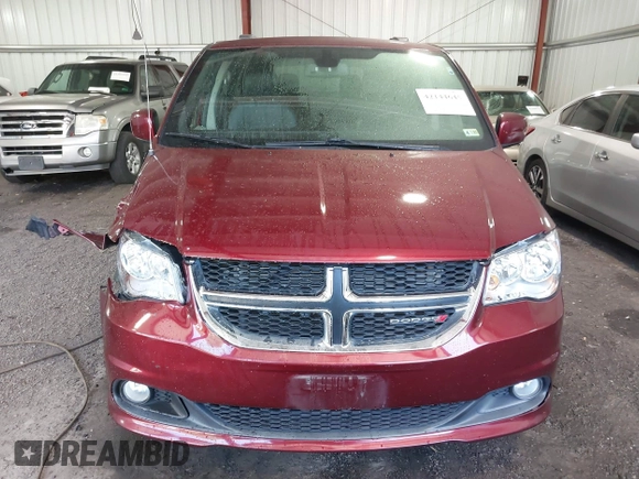 2018 Dodge Grand Caravan SXT with VIN 2C4RDGCG4JR297603, listed as a IAAI auction lot 42144645 with 114,098 mi miles and . Bid and sale history available at DreamBid. Image 12.