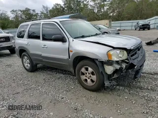 2003 Mazda Tribute LX with VIN 4F2YZ04153KM20941, listed as a Copart auction lot 82683264 with 195,240 mi miles and Salvage Title. Bid and sale history available at DreamBid. Image 11.