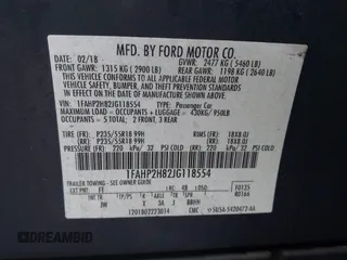 2018 Ford Taurus SEL with VIN 1FAHP2H82JG118554, listed as a IAAI auction lot 41112273 with 67,253 mi miles. Bid and sale history available at carsss.com. Image 9.