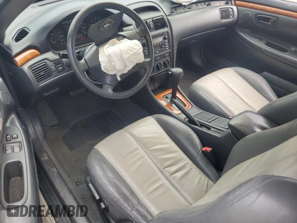 2003 Toyota Solara SE with VIN 2T1CE22PX3C026006, listed as a Copart auction lot 56100085 with 181,244 mi miles and Salvage title. Bid and sale history available at DreamBid. Image 8.