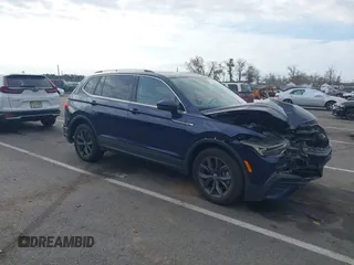 2023 Volkswagen Tiguan SE z VIN 3VVMB7AX3PM006867, wystawiony jako IAAI lot #40793976 z przebiegiem 29 648 mil mil oraz . Historia ofert i sprzedaży dostępna na DreamBid. Obrazek 1.