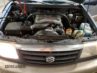 2002 Suzuki Grand Vitara JLX z VIN JS3TD62V524160739, wystawiony jako Copart lot #88416995 z przebiegiem 98 820 mil mil oraz Szkoda całkowita • Salvage title. Historia ofert i sprzedaży dostępna na DreamBid. Obrazek 12.