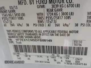 2013 Ford F-150 XL with VIN 1FTEX1CM5DFB88149, listed as a IAAI auction lot 40695089 with 105,049 mi miles. Bid and sale history available at carsss.com. Image 9.
