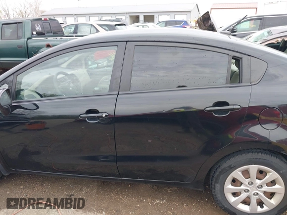 2013 Kia Rio LX with VIN KNADM4A30D6157890, listed as a IAAI auction lot 42066146 with 73,319 mi miles and . Bid and sale history available at DreamBid. Image 14.