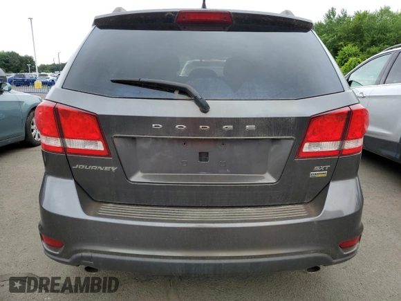 2015 Dodge Journey SXT with VIN 3C4PDCBG7FT669165, listed as a Copart auction lot 62682015 with 145,303 mi miles and Clean title. Bid and sale history available at DreamBid. Image 6.