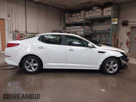 2015 Kia Optima LX with VIN 5XXGM4A7XFG375049, listed as a IAAI auction lot 42198632 with 191,361 mi miles and . Bid and sale history available at DreamBid. Image 14.