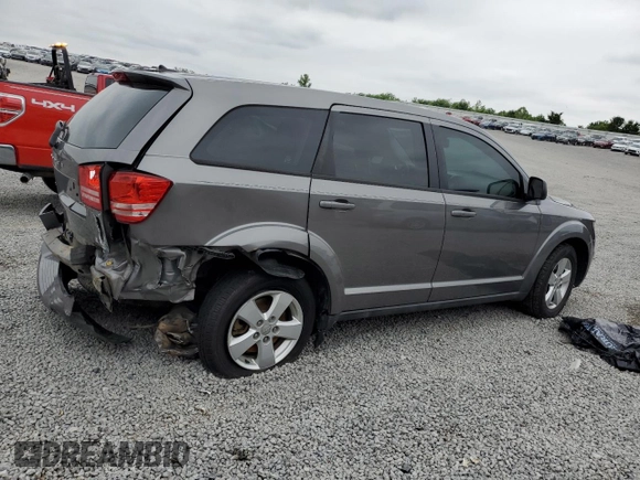 2013 Dodge Journey American Value with VIN 3C4PDCAB7DT500878, listed as a Copart auction lot 58397655 with 183,755 mi miles and Salvage title. Bid and sale history available at DreamBid. Image 3.