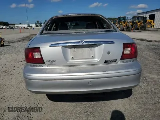 2003 Mercury Sable LS with VIN 1MEHM55S73A619013, listed as a Copart auction lot 73504154 with 200,135 mi miles and Salvage Title. Bid and sale history available at DreamBid. Image 6.