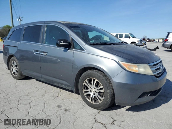 2011 Honda Odyssey EX-L with VIN 5FNRL5H69BB047150, listed as a Copart auction lot 52421595 with 198,233 mi miles and Clean Title. Bid and sale history available at DreamBid. Image 4.